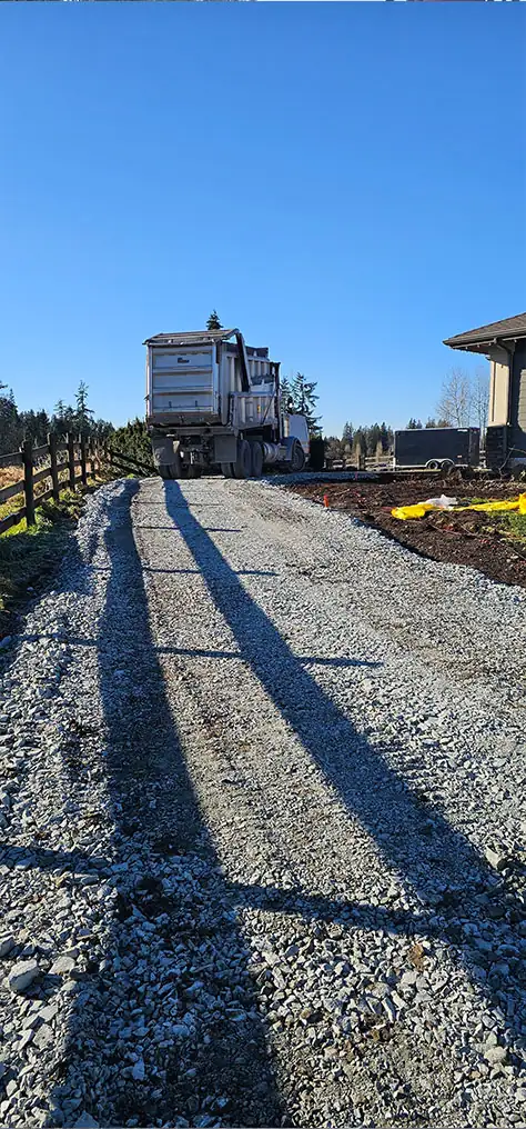 Dozer and track loader building a farm driveway
