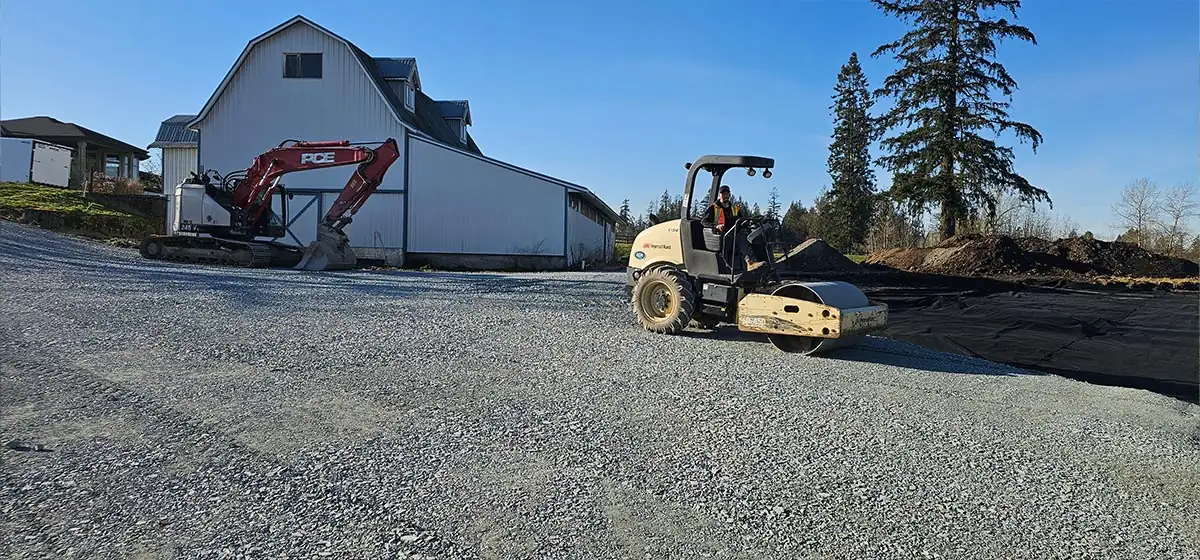 Gravel being placed on geotextile fabric