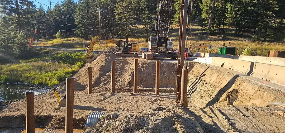 Steel sheet-pile walls around the excavation by the creek