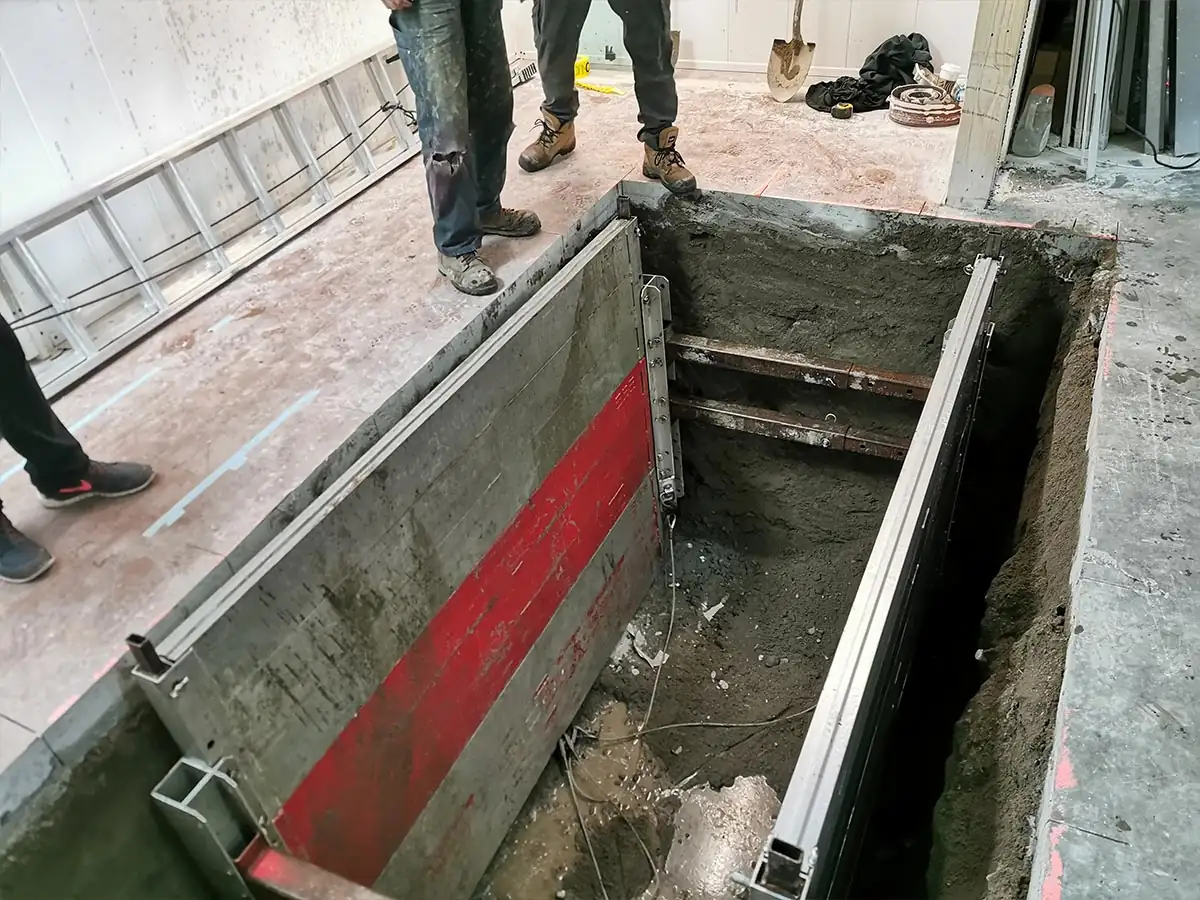 Shoring panels in place at the excavation