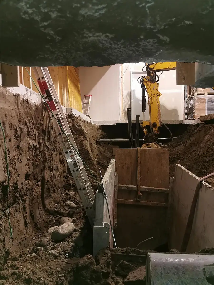 Deep excavation under the wall with ladder access