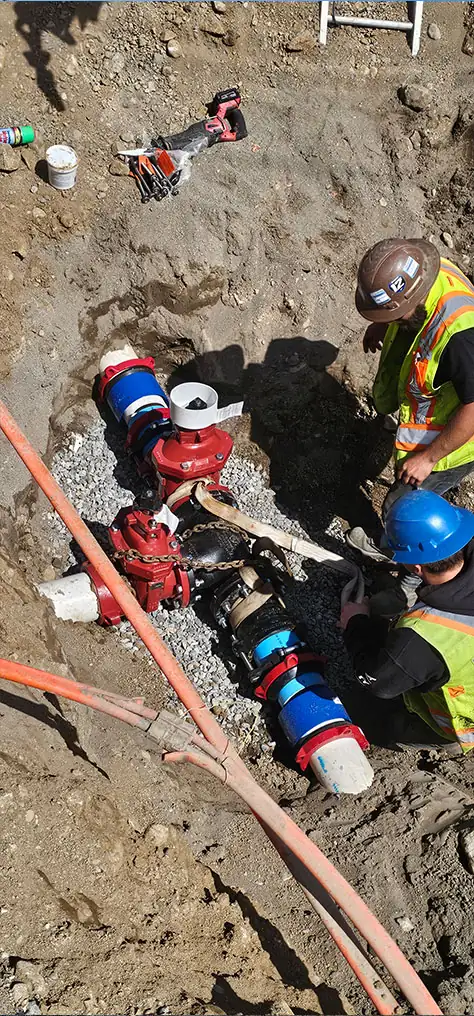 Crew installing new valves on the water main